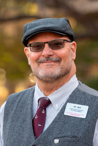 A portrait photo of Dr. Bill Retzlaff