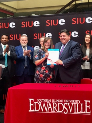 Representative Katie Stuart & Governor J.B. Pritzker