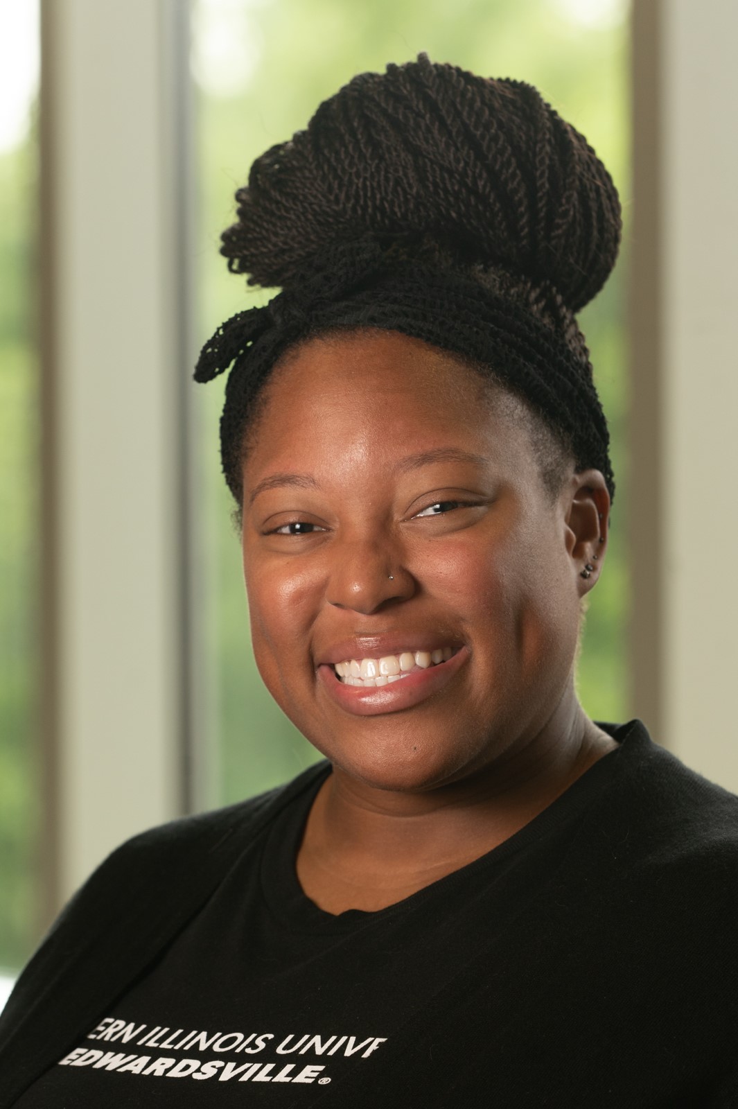 A portrait photo of Adriana Givens-Keeper, MA