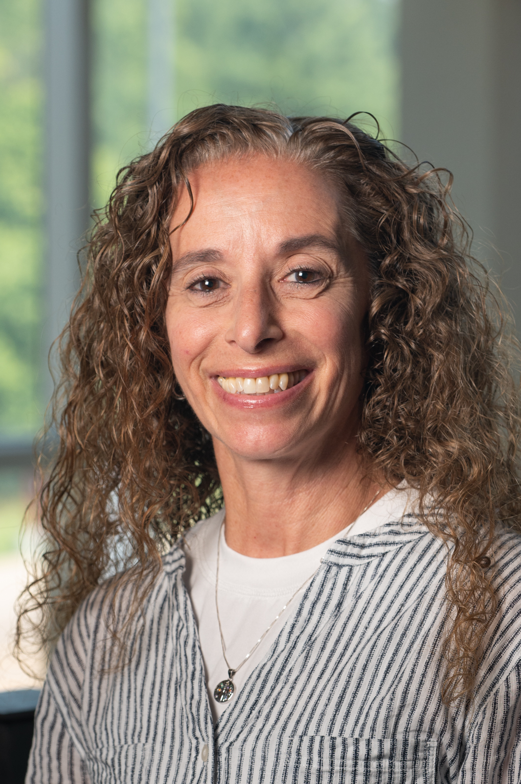 A portrait photo of Katherine Mora PhD, RD