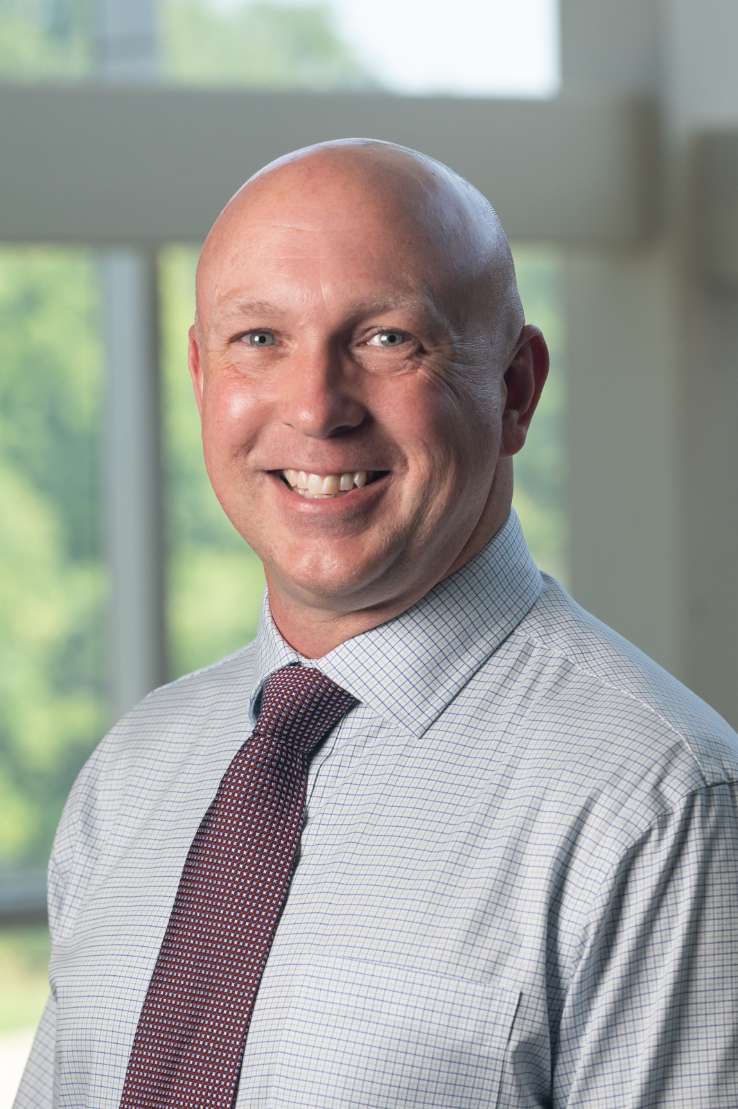 A portrait photo of Joshua Wooten, PhD